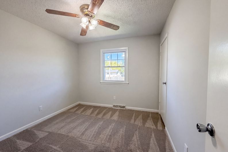 Photo 4 of 19 of 231 Downey Dr, Wellsville, KS