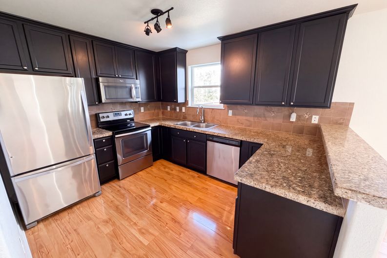 Photo 10 of 35 of 2084 Basil St, Strasburg, CO