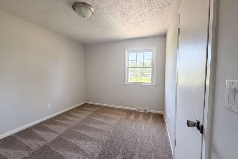 Photo 10 of 19 of 231 Downey Dr, Wellsville, KS