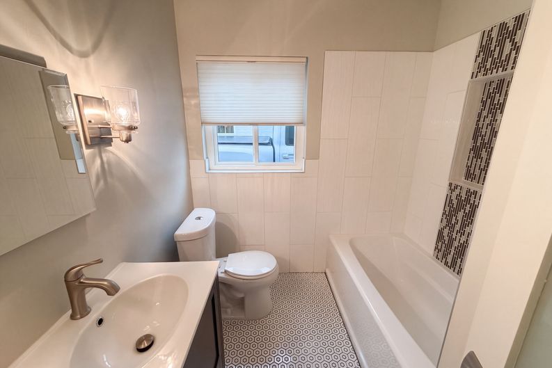 Photo 11 of 18 of 1560 Leyden St, Denver, CO