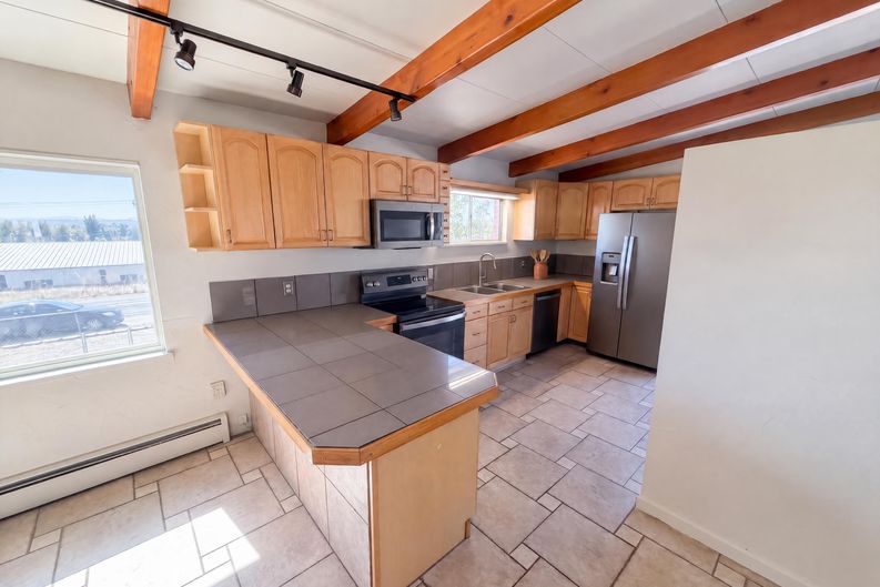 Photo 3 of 63 of 7811 W 62nd Ave, Arvada, CO