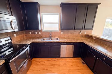 Photo 2 of 35 of 2084 Basil St, Strasburg, CO