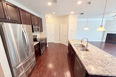 Photo 2 of 24 of 10555 Naramore Ln, Alpharetta, GA