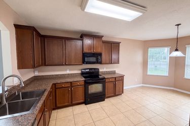 Photo 2 of 24 of 12902 Scout Ct, Grand Island, FL