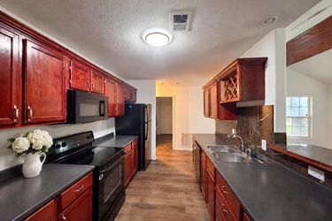 Photo 2 of 17 of 905 S Butler Ter, Harrisonville, MO