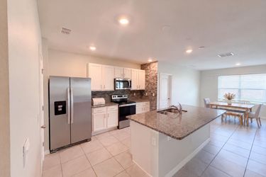 Photo 2 of 25 of 2112 Elio Ridge Dr, Zellwood, FL
