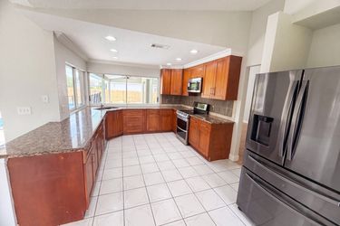 Photo 2 of 29 of 711 SE Celtic Ave, Port Saint Lucie, FL