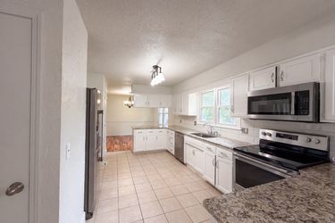 Photo 2 of 39 of 14224 S Raintree Dr, Olathe, KS