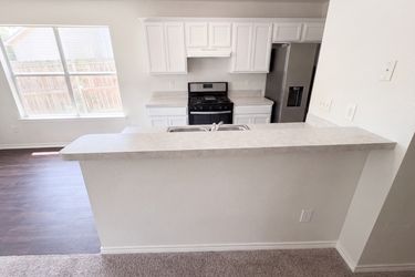 Photo 2 of 17 of 1555 Parkfield Cir, Round Rock, TX