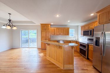 Photo 2 of 22 of 403 S Lakeshore Dr, Raymore, MO