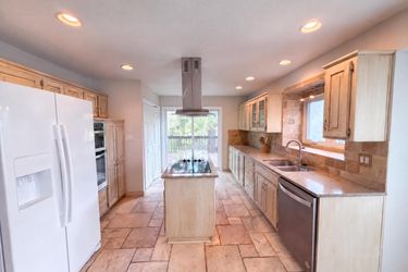 Photo 2 of 19 of 1204 NW Timber Oak Dr, Blue Springs, MO