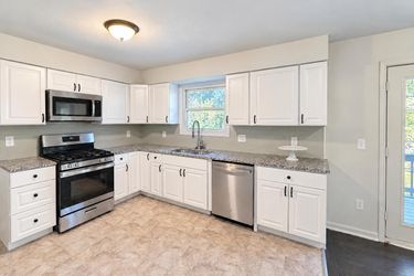 Photo 2 of 17 of 1400 NW 65th Ter, Kansas City, MO