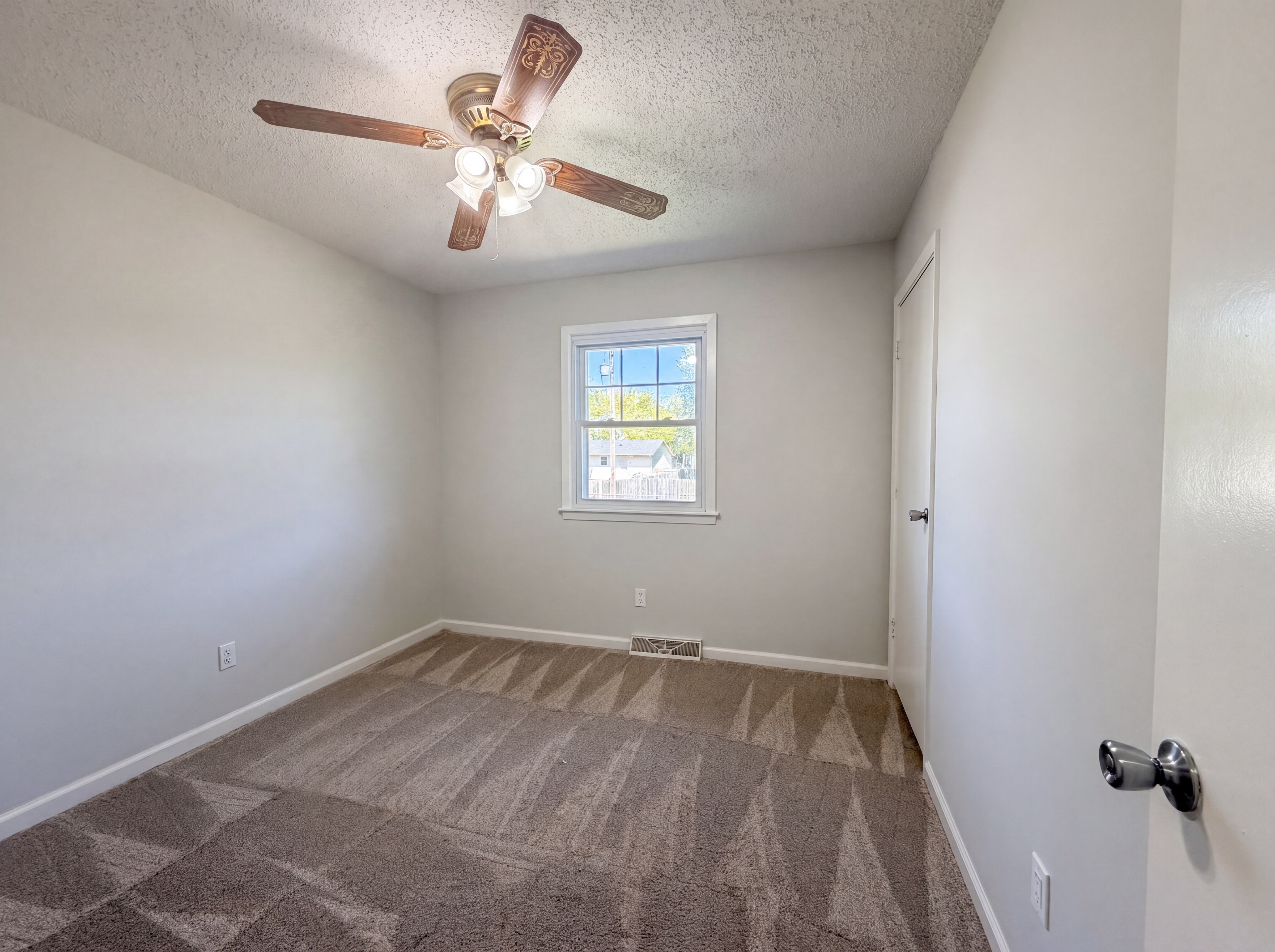 Photo 4 of 19 of 231 Downey Dr, Wellsville, KS