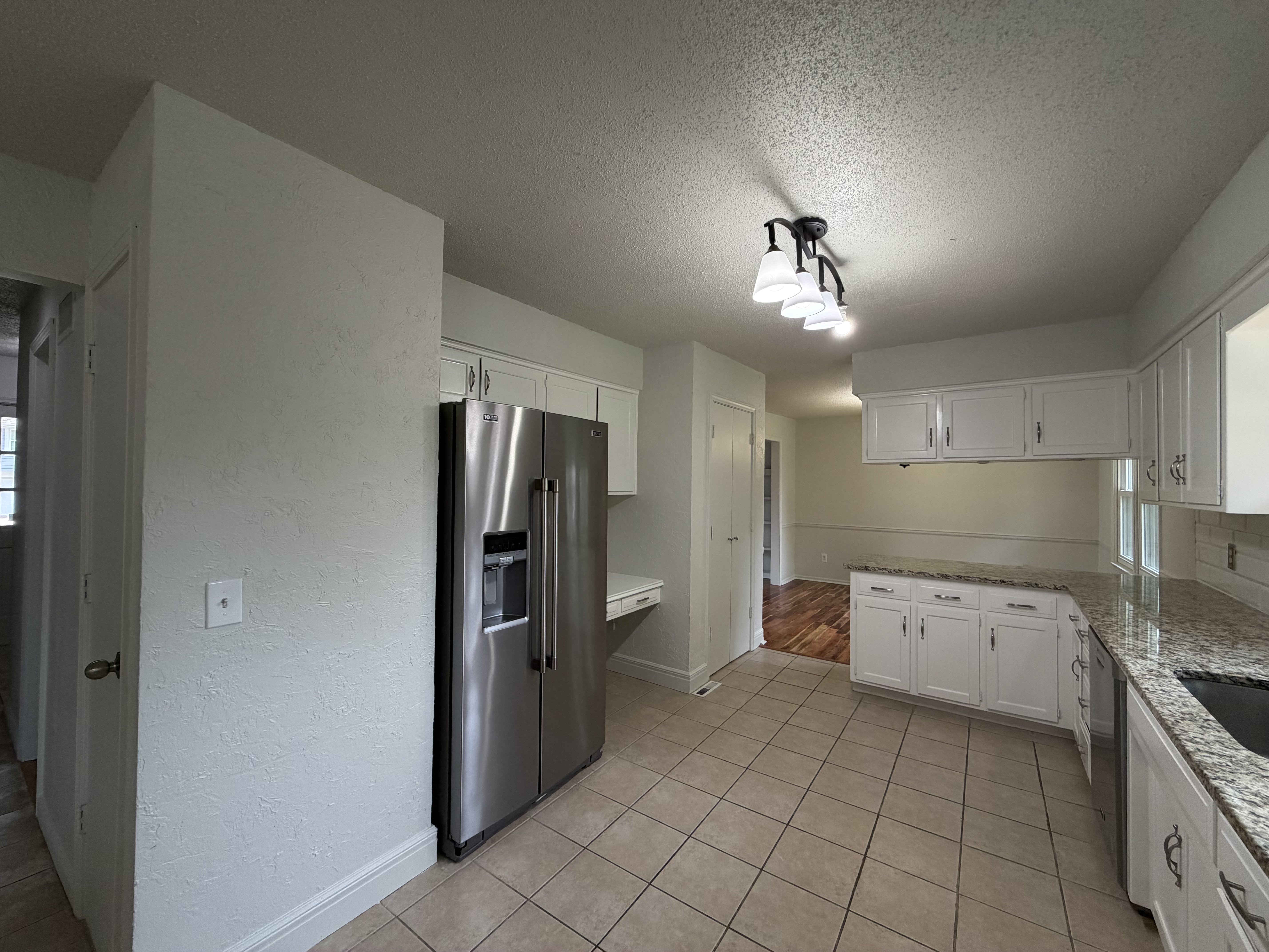 Photo 9 of 39 of 14224 S Raintree Dr, Olathe, KS