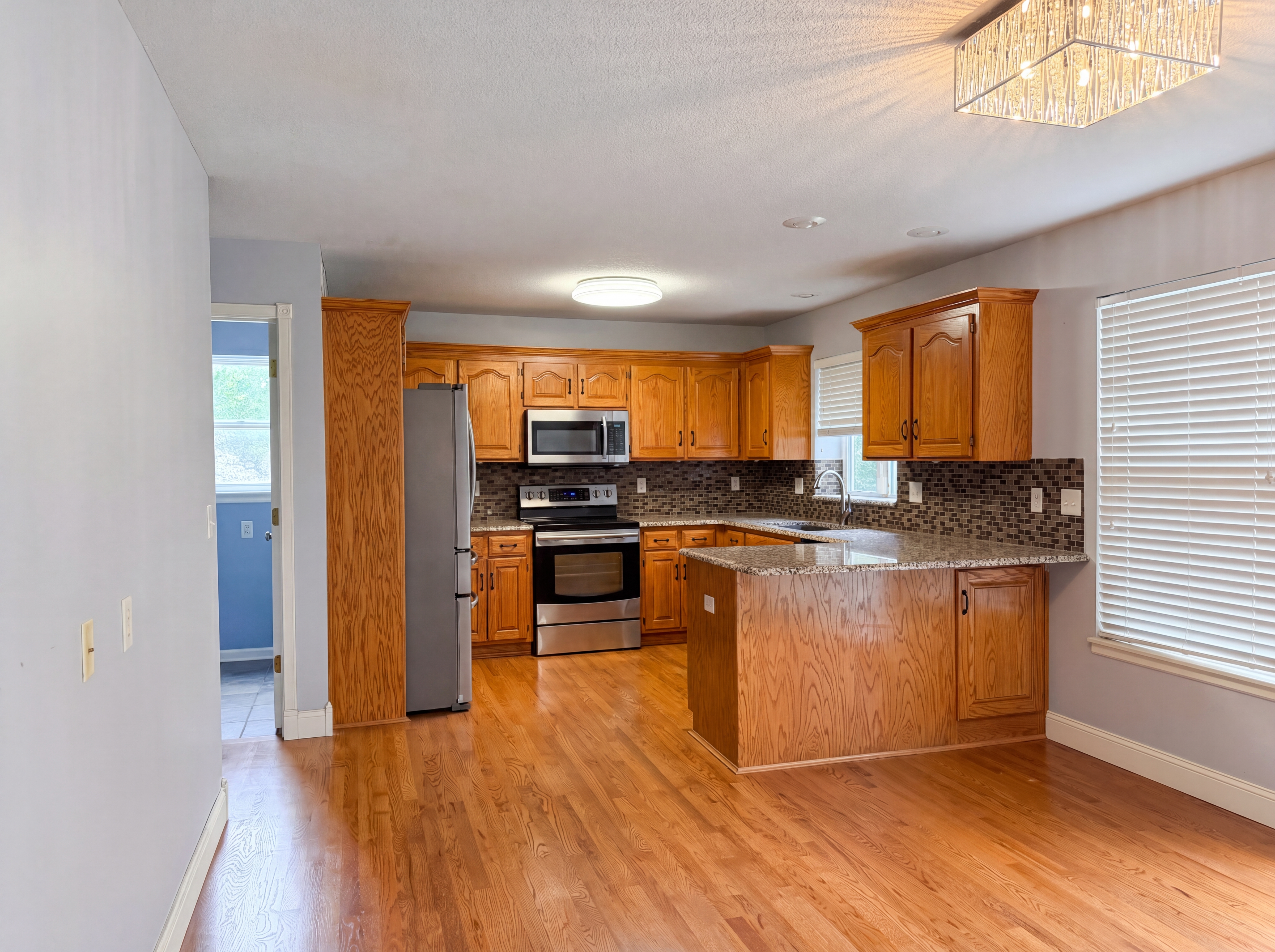 Photo 2 of 22 of 23612 S Lucille Ln, Peculiar, MO