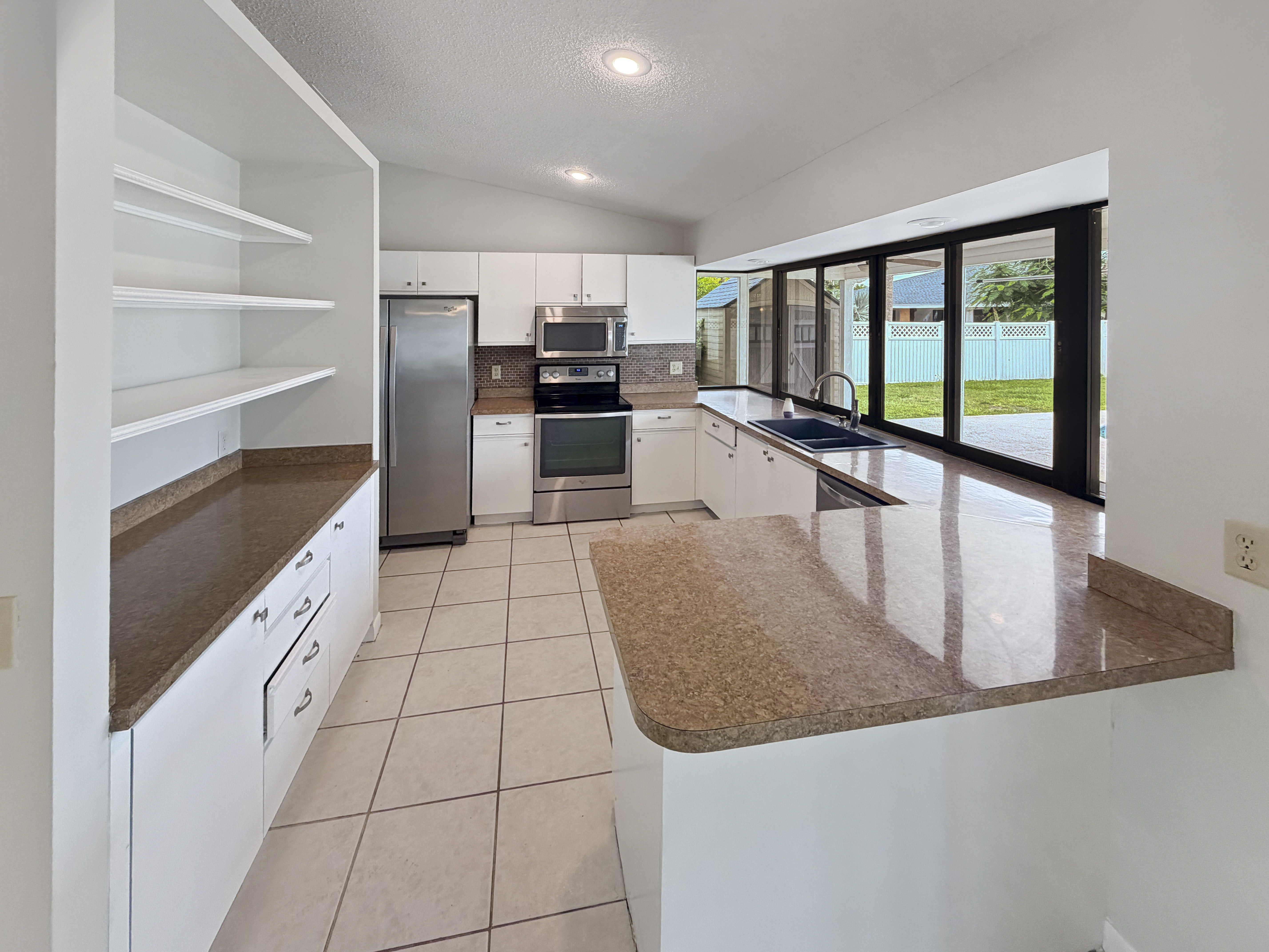 Photo 2 of 38 of 2305 SW Fern Cir, Port Saint Lucie, FL