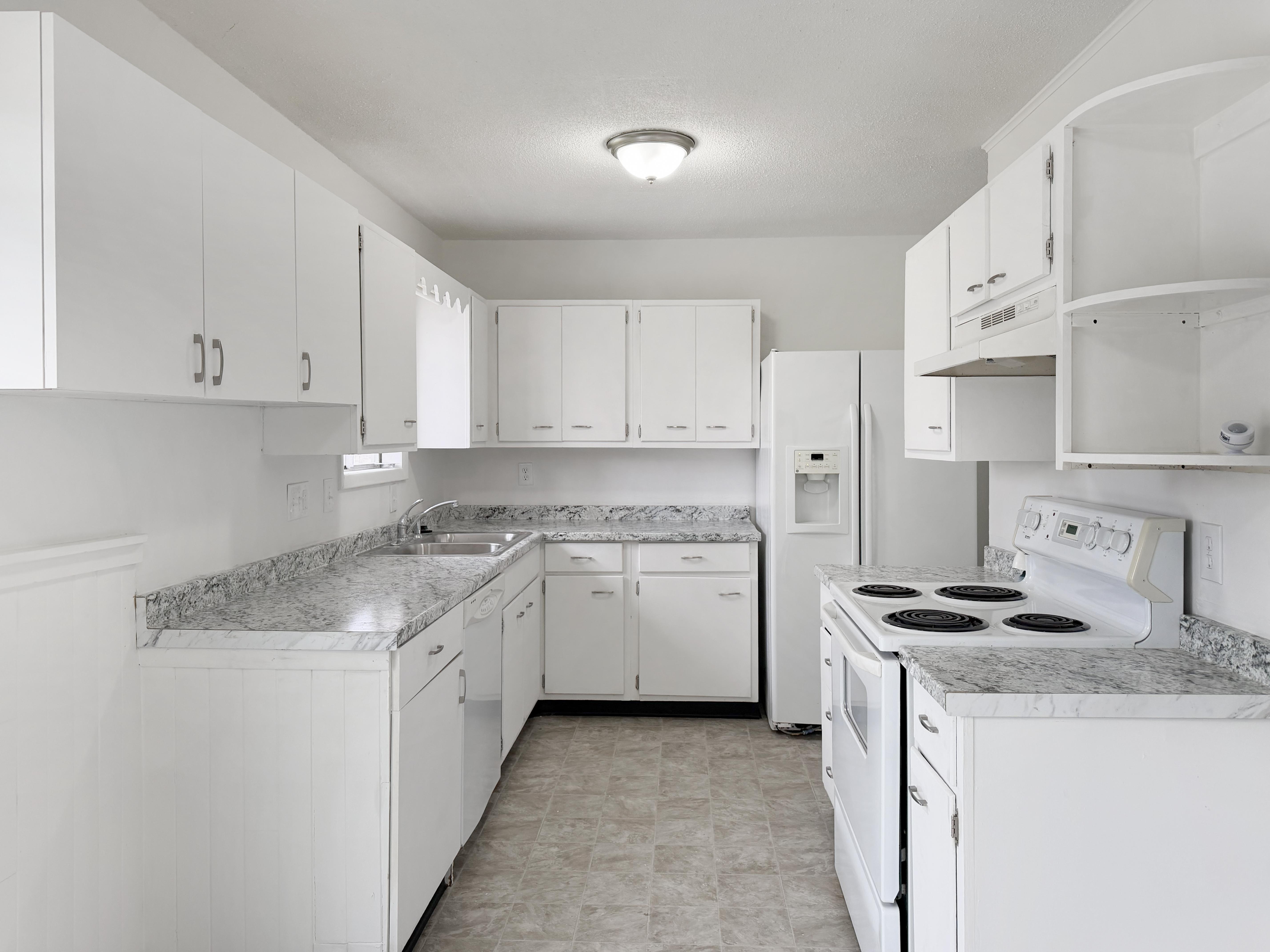 Photo 2 of 16 of 5342 N Palmer Ave, Kansas City, MO