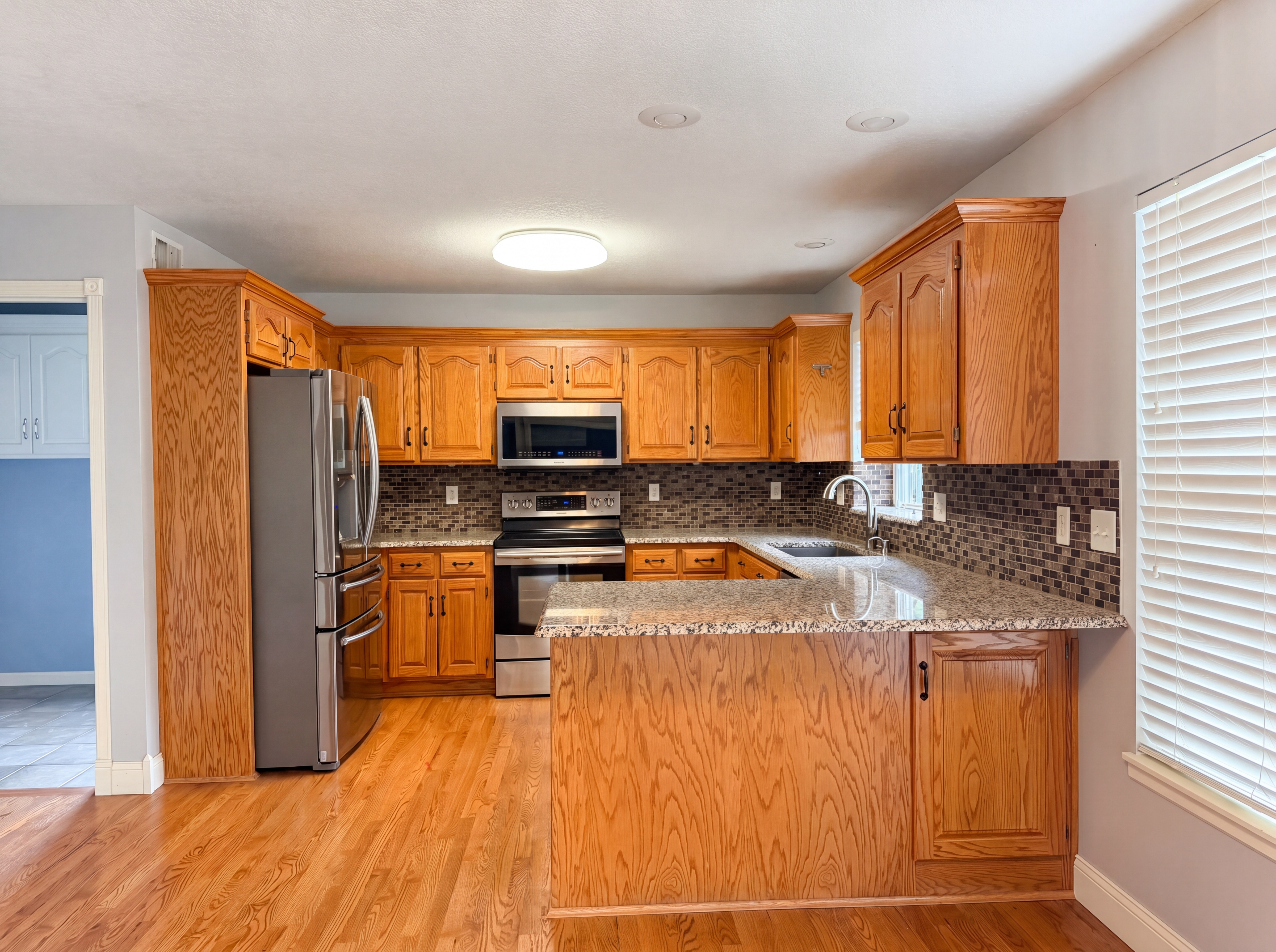 Photo 6 of 22 of 23612 S Lucille Ln, Peculiar, MO