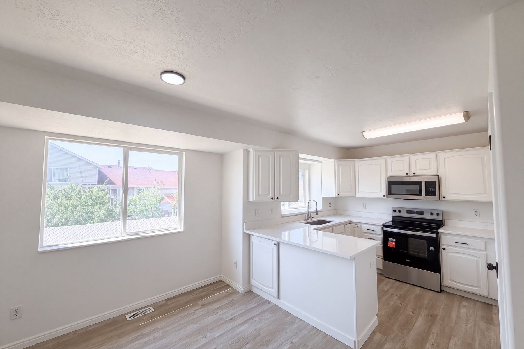 Photo 2 of 25 of 1443 W 3605 S, West Valley City, UT