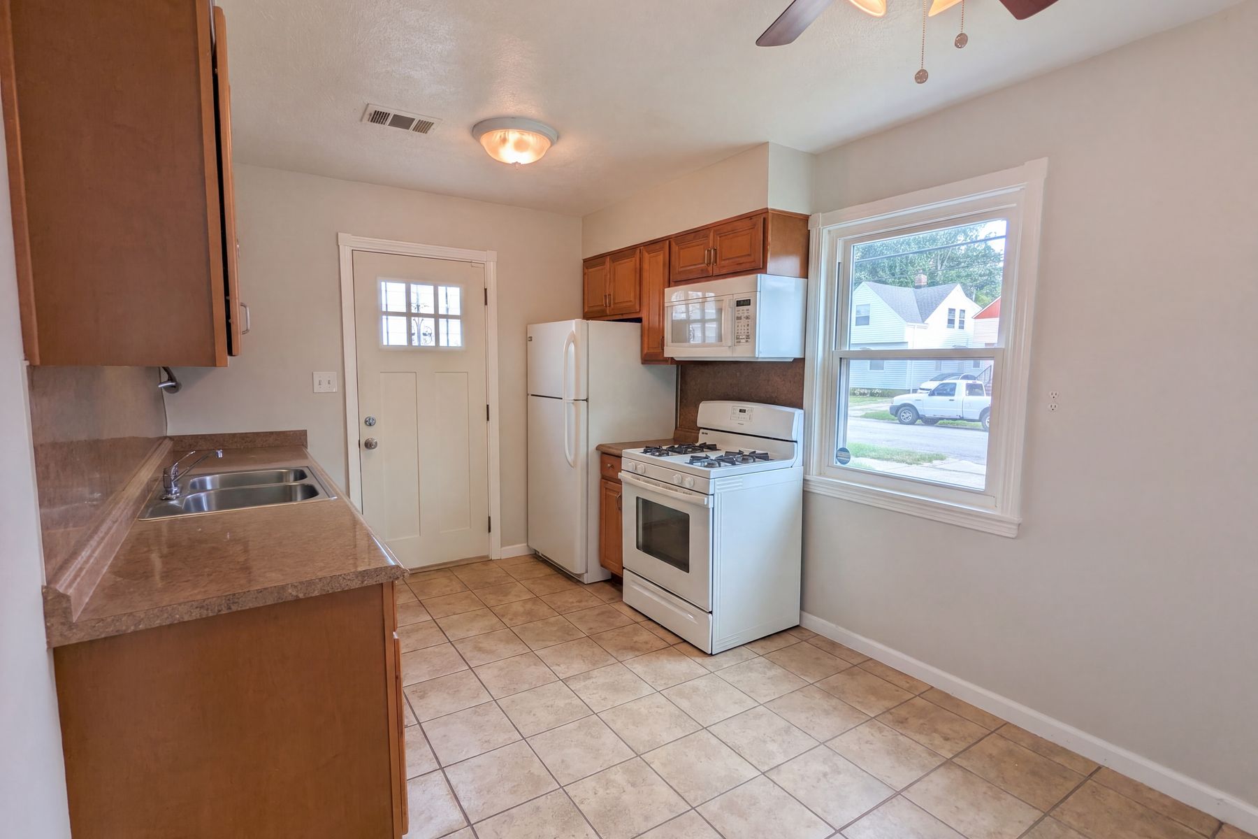 Photo 2 of 19 of 12722 Emery Ave, Cleveland, OH