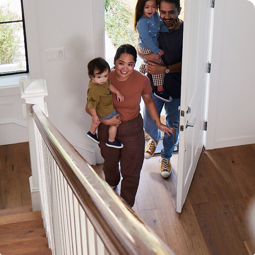 Family entering home