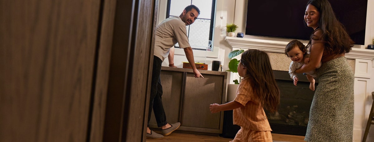 Family playing in kitchen