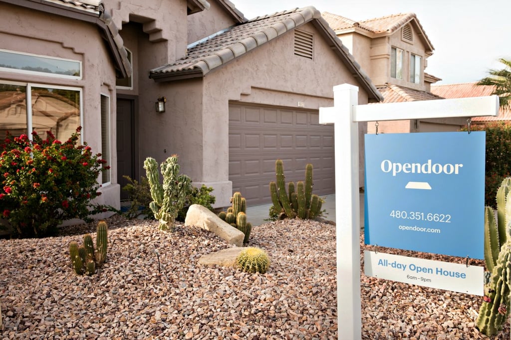 Couple reviewing mortgage paperwork after resolving bankruptcy