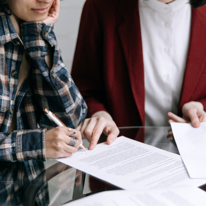 A client signing a document