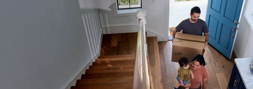 Image of a family moving in to a home.