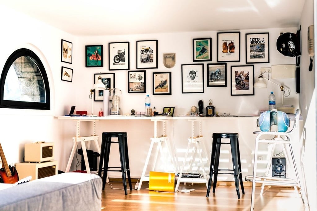 Sunlit living room with sofa, coffee table, and framed art staged for an appraiser's daytime inspection