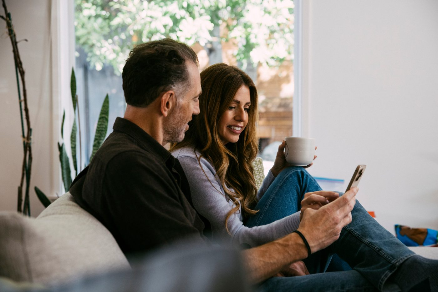A couple at home reviewing their mortgage rate together